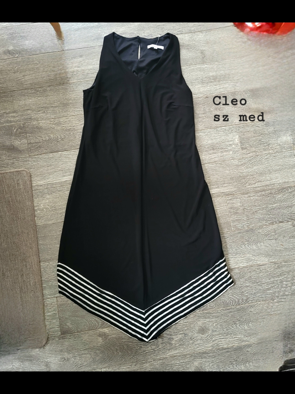 cleo Black Sleeveless V-Neck Asymmetrical Hem Dress with Striped Trim
